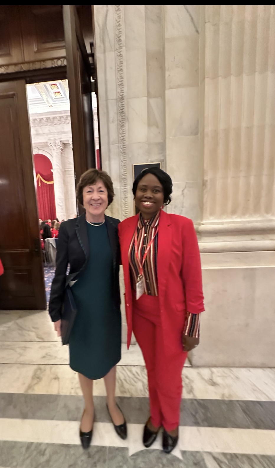 
Dorcas Buzigire George with Senator Susan Collins.
